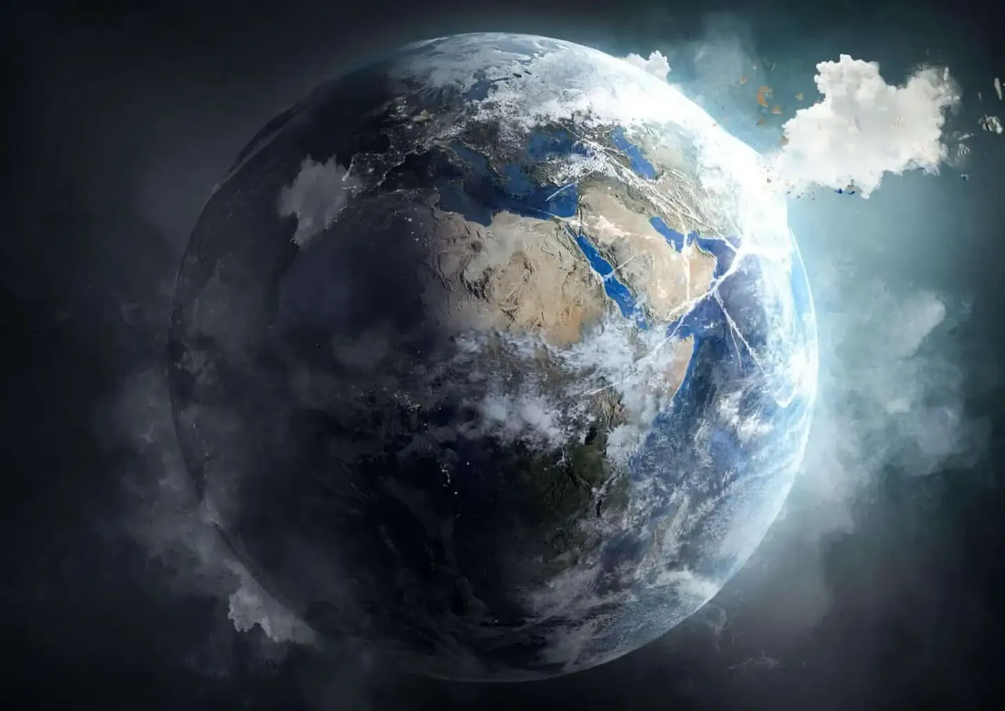 Earth with dramatic lighting and clouds